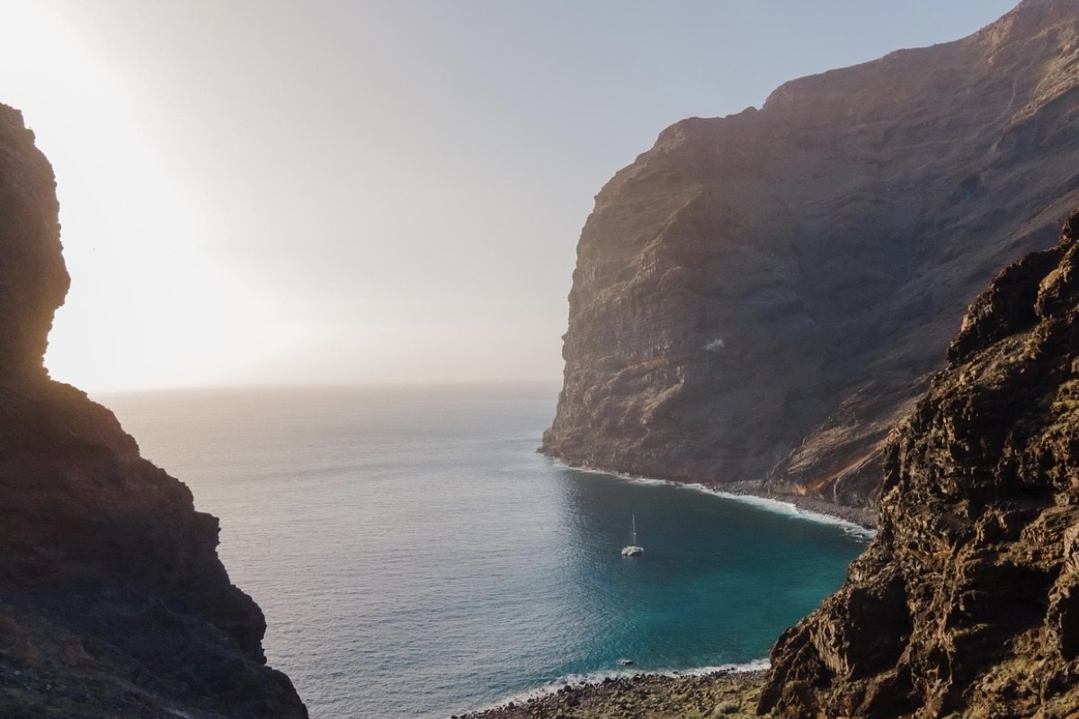 A bay shot from high up on a cliff, with morning sun shining gently